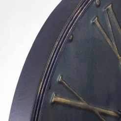 PENDULE METAL EMBOSSE D.77CM